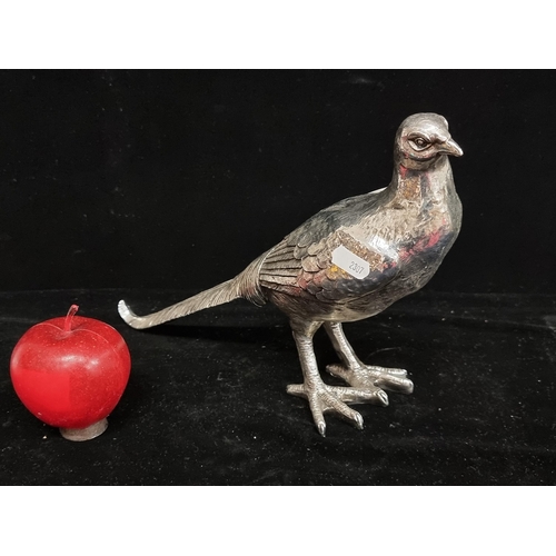 100 - A silver-toned pheasant figure. A nice, striking decorative object