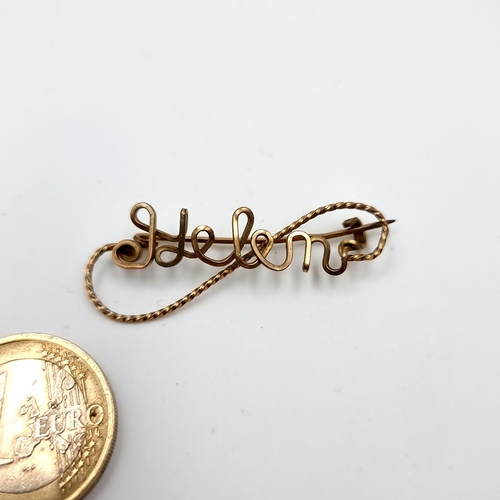 21 - An attractive scroll beaded design brooch with the name Helen spelled out. Pin intact. probably 9ct ... 