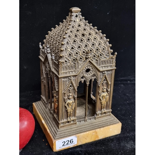 226 - A very unusual, antique very heavy candle holder in the form of a Gothic Baptistry. A very ornate pi... 