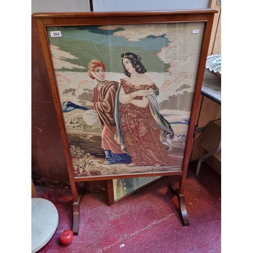 264 - Star lot : A fantastic large 19th century fire screen featuring a highly detailed embroidered panel ... 