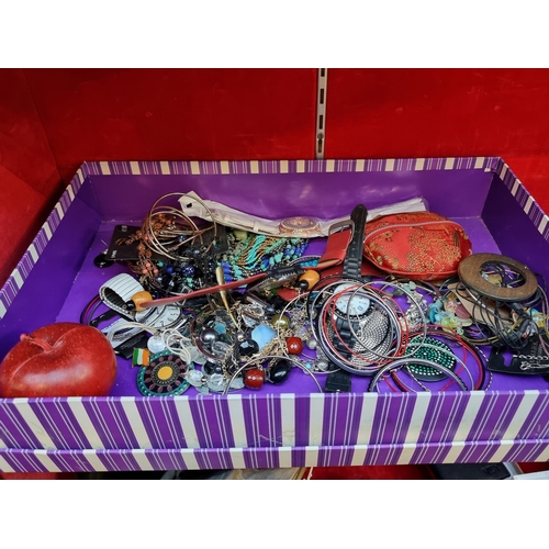 266 - A selection of costume jewellery including various beaded necklaces, earrings, watches and bangles, ... 