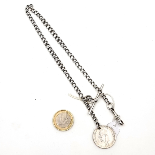 30 - A sterling silver albert chain with a medallion in the form of a Swedish krona dating to 1946. 
tota... 
