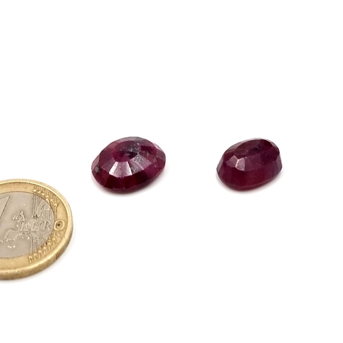 371 - Two beautiful natural ruby gemstone. Weight of 11.57 & 10.2  carats.  Cold to the touch and accompan... 