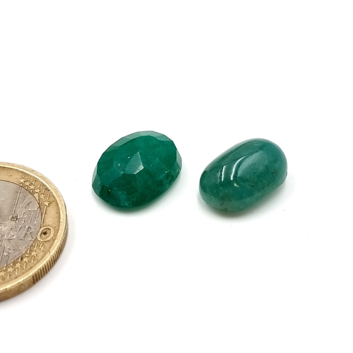 373 - Two natural Columbian emerald gemstone. Weight of 6.55  & 5.8 carats.  Cold to the touch and accompa... 