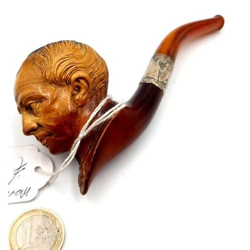 38 - A Meerschaum carved pipe in the form of an ecclesiastical figure set with attractive foliate design ... 