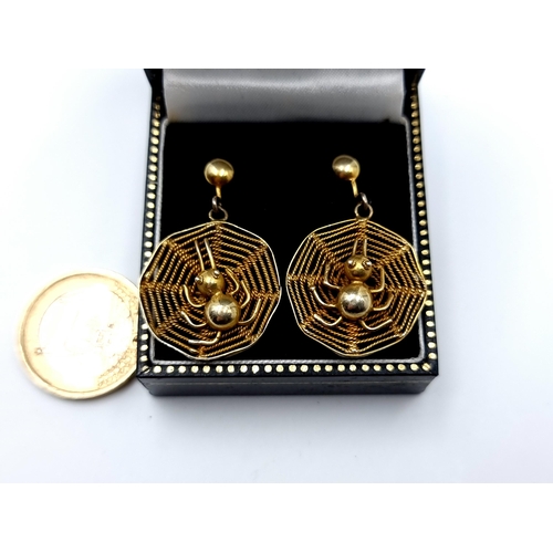 403 - A super pair of 9 carat gold stud earrings Spiders set in a spider web.Total weight: 6.8 grams