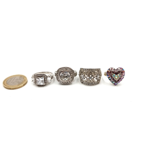 412 - A collection of four very pretty gem stone set rings in sizes M (2),  R(2)
Total weight: 26.63 grams