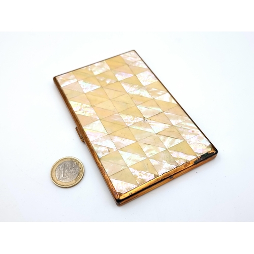 437 - A nice example of a vintage Swiss made Agme mother of pearl cigarette case with attractive gilt mach... 