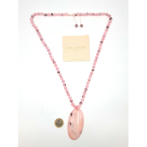 441 - A very pretty Lola Rose London polished rose quartz necklace in original presentation pouch.
Length:... 