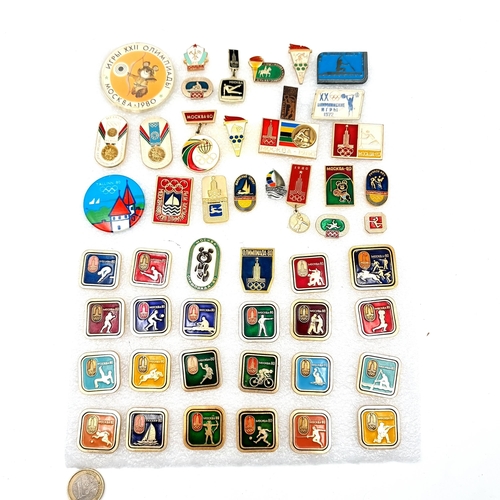 444 - A collection of over 50 Russian Olympics pins celebrating the 1972 and 1980 games. All pins intact, ... 