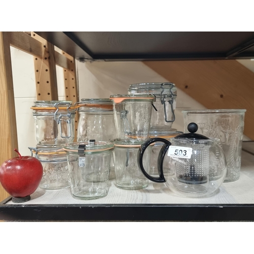 503 - Nine pieces of glass kitchenware including a Bodum clear coffee press, eight sealable mason jars and... 