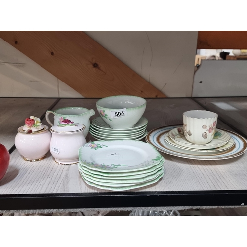 504 - Twenty pieces of china tea service including Stanley seafoam green saucers, milk jug and sugar bowl,... 