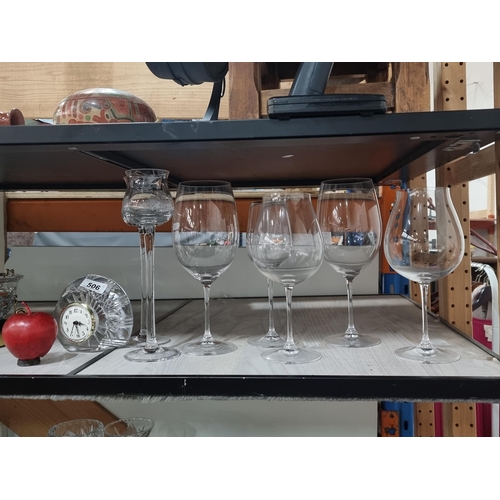 506 - A selection of eight glassware items including a charming cut glass mantle clock, seven over sized w... 