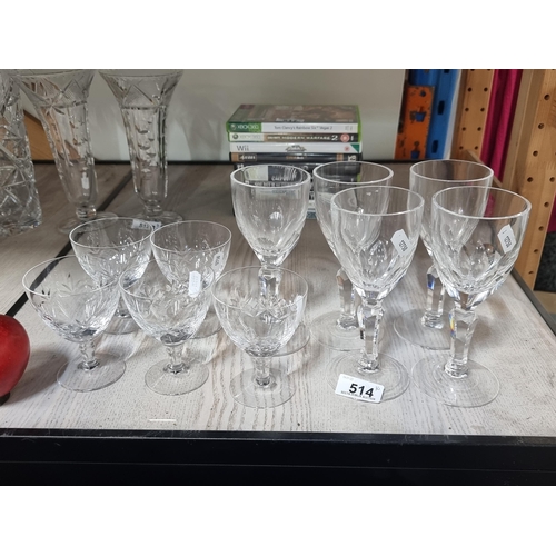 514 - Ten stemmed wine glasses including five neatly proportioned fine examples as well as five other tall... 