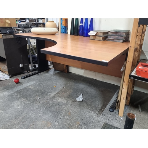 515 - A large high quality radial office desk with a curved edge for comfortable access and black metal ba... 