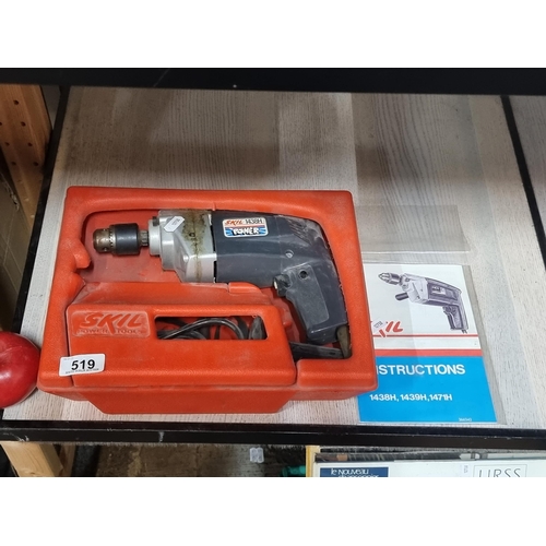 519 - A Skil power tools drill. Model 1438H. Complete with original box and instruction manual.