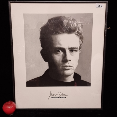 56 - A print of iconic movie star James Dean, in black and white. Shows a portrait of the star in his cla... 