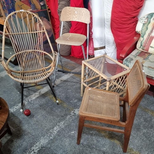 591 - Four vintage furniture items including a great bamboo rocking chair on steel rails. Accompanied by a... 