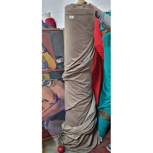 592 - A large bolt of fawn brown fabric with very slight elastic give. Lots of value here.