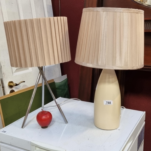 788 - A stylish pair of contemporary table lamps, including one example with a sleek chrome tripod base. B... 