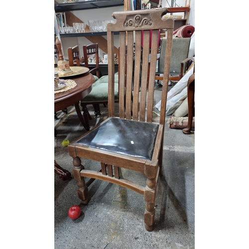 569 - A very handsome antique high backed chair. Featuring beautiful bentwood slatted backrest and turned ... 