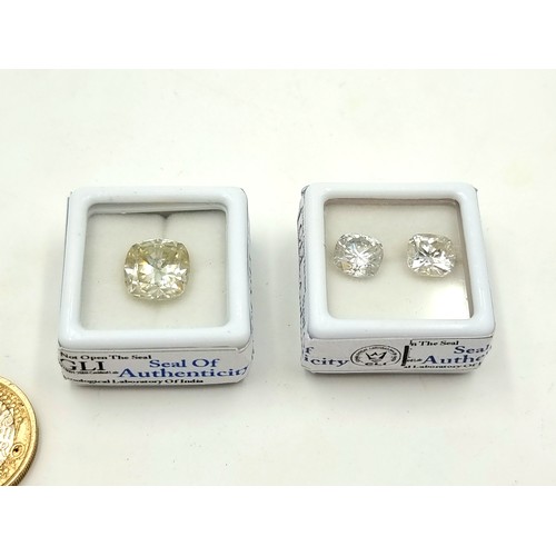 397 - A 4.74 carat pair of cushion cut white moissanite gem stones. With a 4.83 cushion cut white moissoni... 