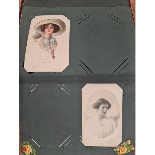 139 - A beautiful, early picture postcard album dated to 1915. Including approximately seventy Edwardian p... 