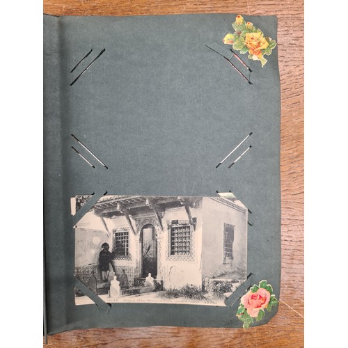 139 - A beautiful, early picture postcard album dated to 1915. Including approximately seventy Edwardian p... 