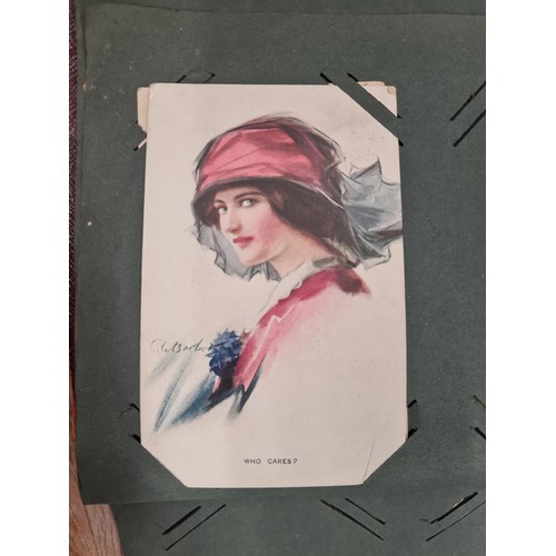 139 - A beautiful, early picture postcard album dated to 1915. Including approximately seventy Edwardian p... 