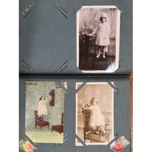 139 - A beautiful, early picture postcard album dated to 1915. Including approximately seventy Edwardian p... 