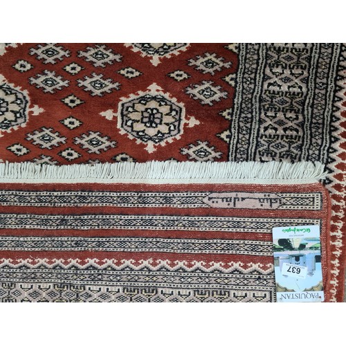 637 - Star lot : A brand new, 100% wool, Pakistani made hall runner rug. Designed in shades of sienna brow... 