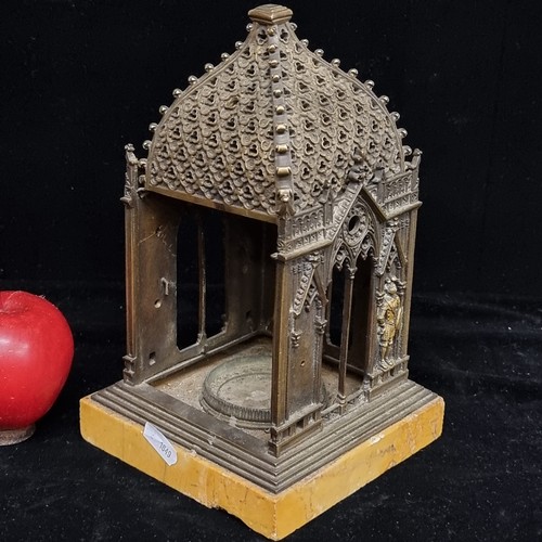 226 - A very unusual, antique very heavy candle holder in the form of a Gothic Baptistry. A very ornate pi... 