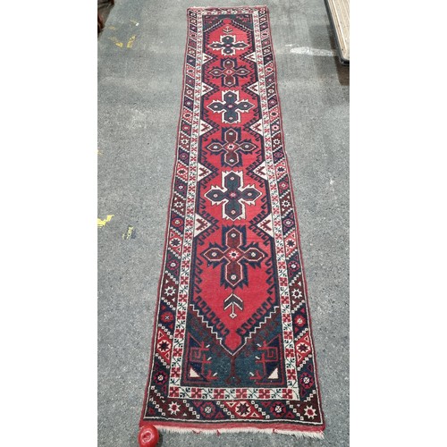 777 - Star lot : A hand knotted vintage Kars Kazak hall runner rug made in Turkey from short pile wool on ... 