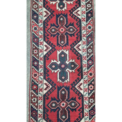 777 - Star lot : A hand knotted vintage Kars Kazak hall runner rug made in Turkey from short pile wool on ... 