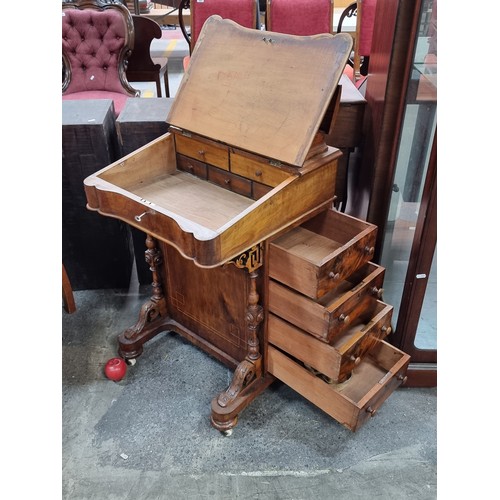 481 - Star Lot: A stunning Victorian burr walnut Davenport desk. Manufactured c. 1860. The writing slope t... 