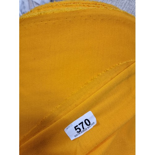 570 - A very large bolt of mustard yellow fabric with slight elastic give. Lots of value here.