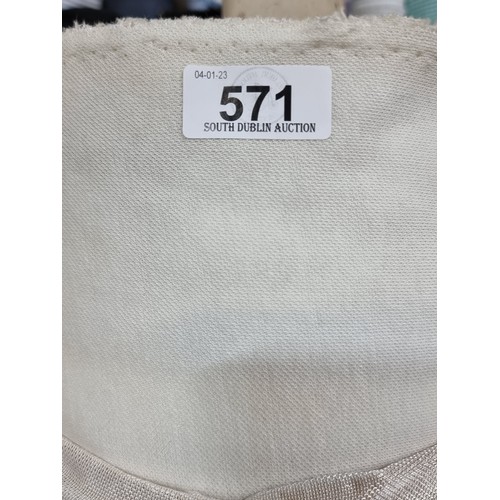 571 - A large bolt of cream fabric with slight elastic give. Lots of value here.