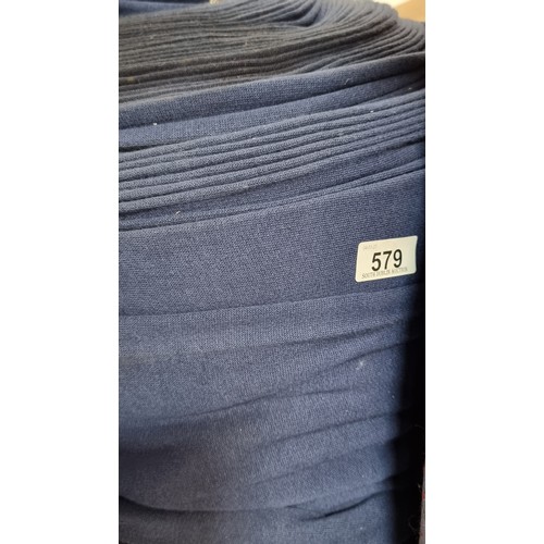 579 - A large bolt of navy blue fleece fabric with slight elastic give. Lots of value here.