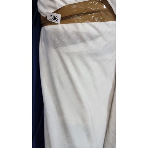 596 - A large bolt of cream fabric with slight elastic give. Lots of value here.