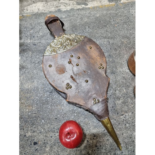 779 - Antique leather fireplace bellows. With brass fittings and embossed foliate panel. Working.