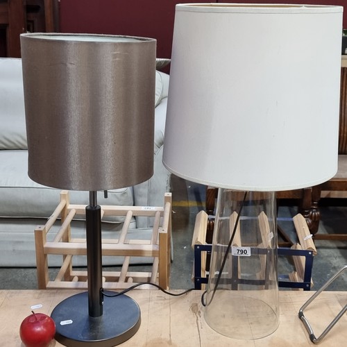 790 - Two stylish contemporary table lamps including one with a clear glass base and cream shade and the o... 