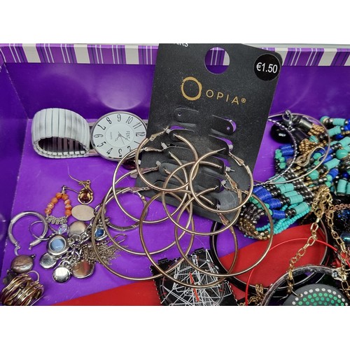 266 - A selection of costume jewellery including various beaded necklaces, earrings, watches and bangles, ... 