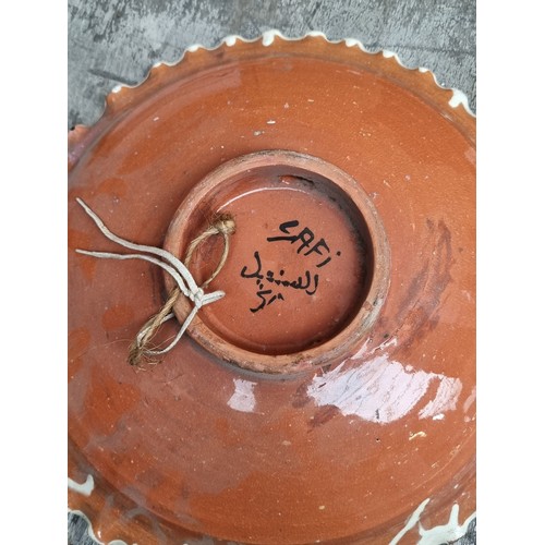 712 - A very striking vintage Moroccan art pottery Charger.. Crafted in the city of Safi in a terracotta c... 