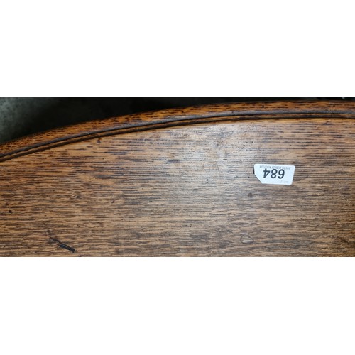 684 - Star Lot : A fabulous and unusual Victorian oak dining table of oval form. Carved from oak with heav... 