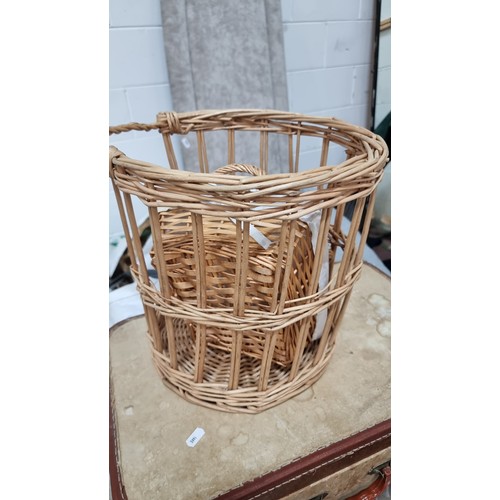 616 - A very large number of wicker baskets. Included are lobster style baskets, fruit baskets, flower bas... 