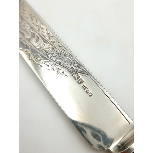 424 - A large  sterling silver bladed cake knife with attached bone handle hallmarked Sheffield, made by H... 