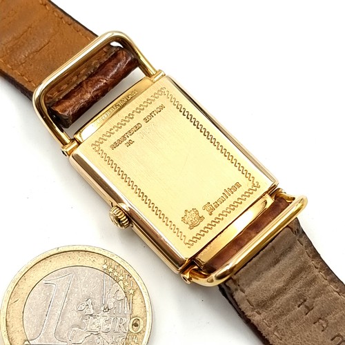 716 - A Lovely tank style Hamilton wristwatch with 18k gold plated body with enamelled dial together with ... 