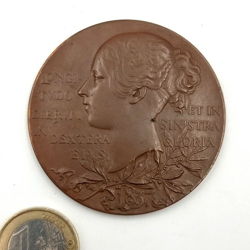 717 - A Queen Victoria celebratory plaque of a 60 year reign, 1837 to 1897. Item in original leather prese... 