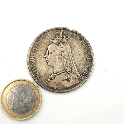 718 - An old Queen Victoria sterling silver crown dated to 1889. 
Weight: 27.72 grams