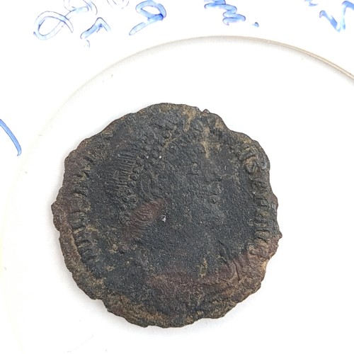 754 - An ancient Constantius II Follis 351-355 AD coin. More pics to follow.